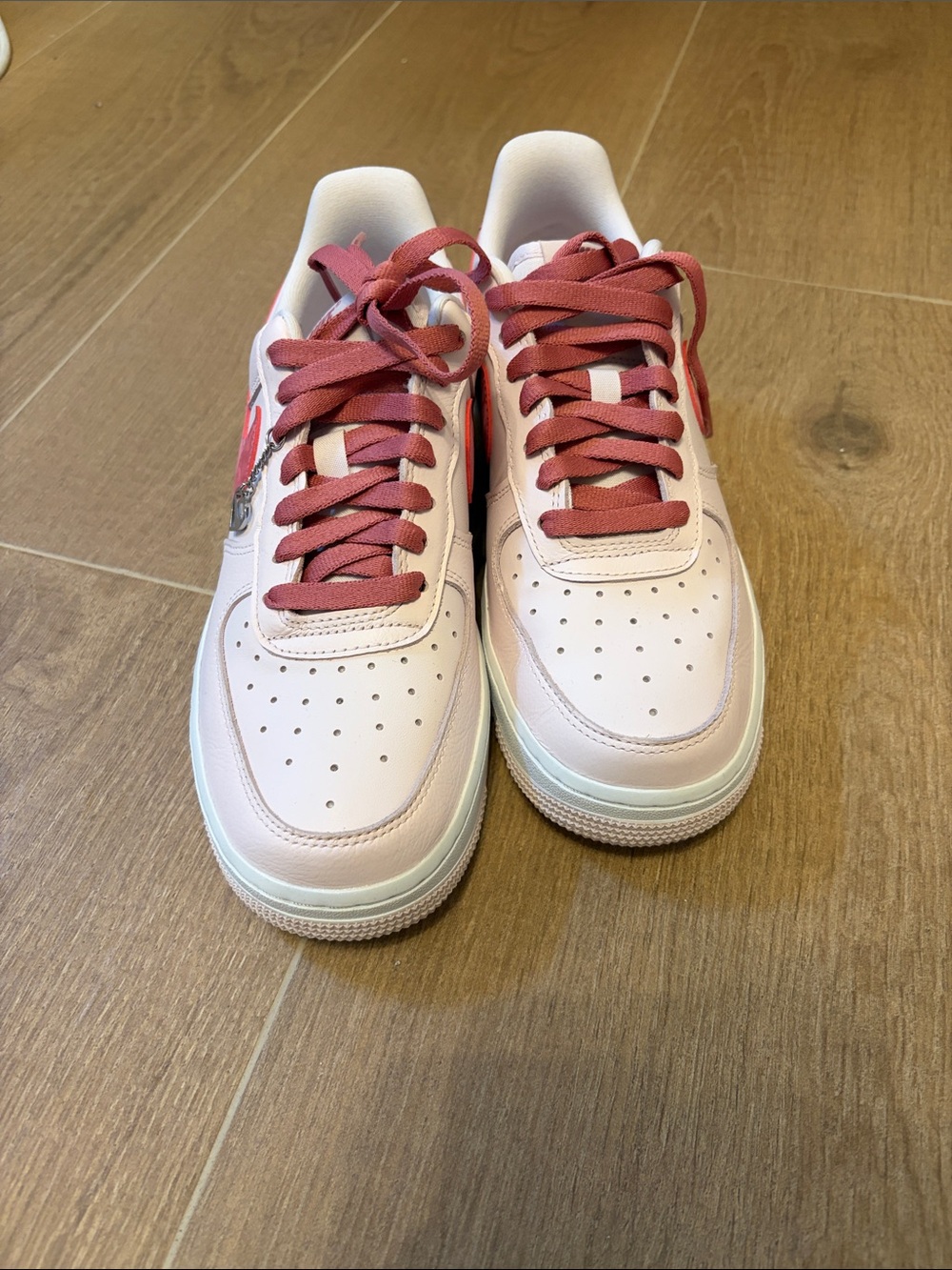 Nike Women’s Low-Top Sneakers in Light Pink with Rose Laces